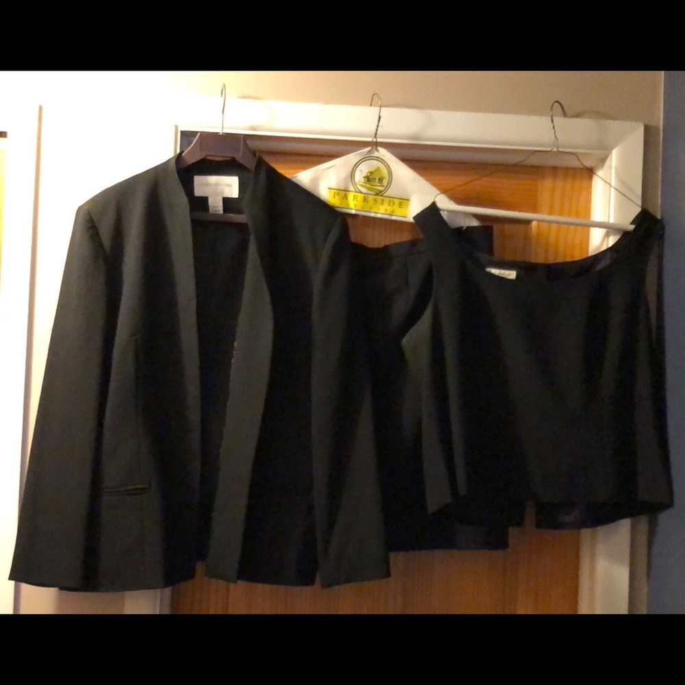 3 piece suit… skirt, blazer, tank top style top.